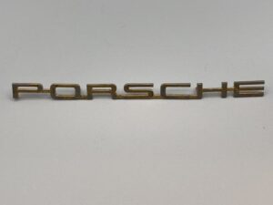 644.559.301.06 – Porsche emblem